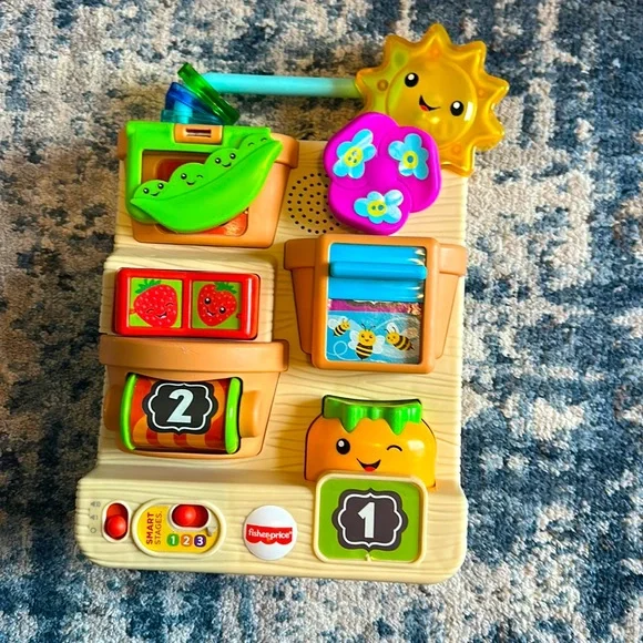 Fisher-Price Laugh Learn Peek Play Busy Garden Activity Toy